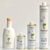 Complete Thallón high-phenolic EVOO range: glass bottle and three recyclable tins